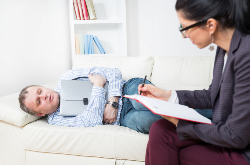 sales man on bed crying