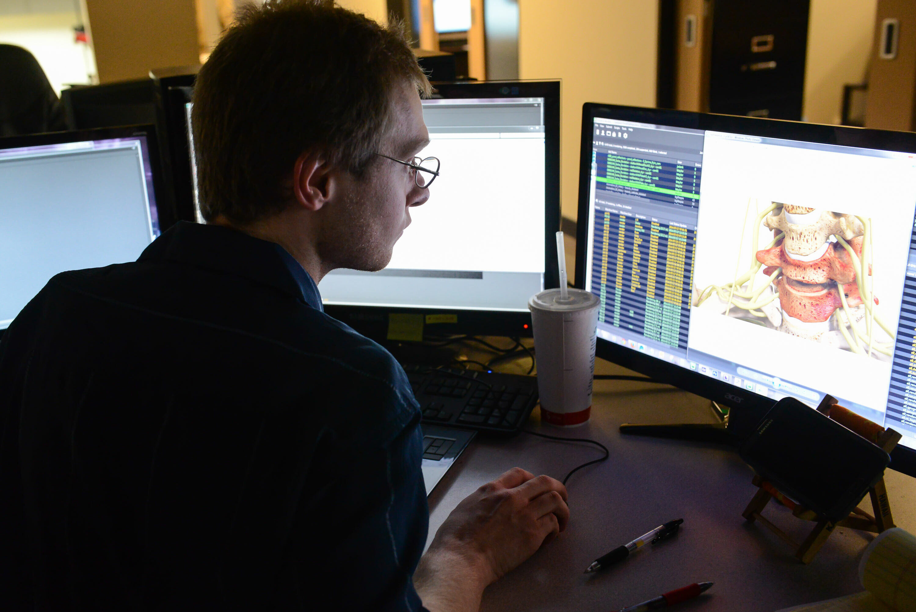 man editing on computer